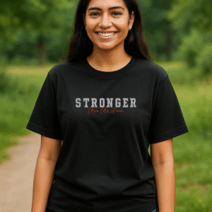 Oversized Black Women’s T-Shirt – Stronger Than the Storm | Checks & Solids